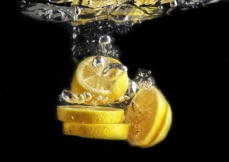 lemon slices bubbles,black back groundの写真素材