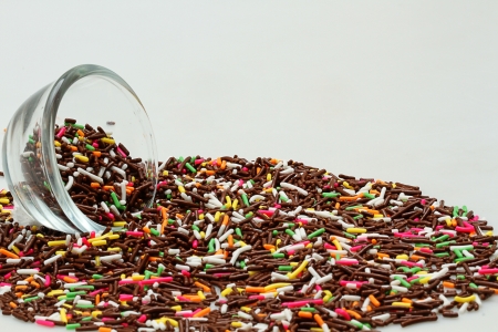 pouring sprinkle color chocolateの写真素材