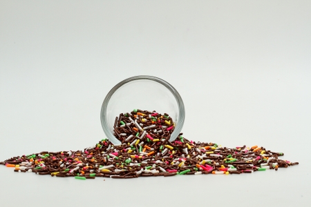 pouring sprinkle color chocolateの写真素材