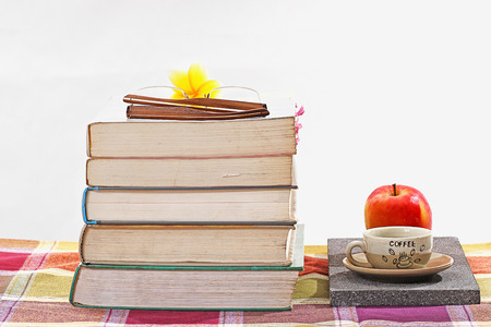 pile of thick booksの写真素材