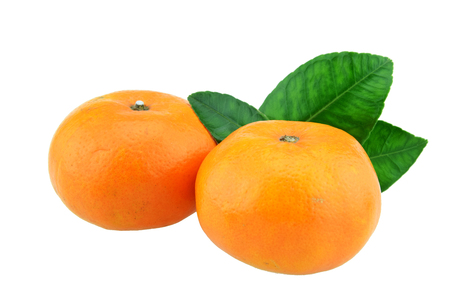 Orange fruit with half and leaves isolated on white backgroundの写真素材