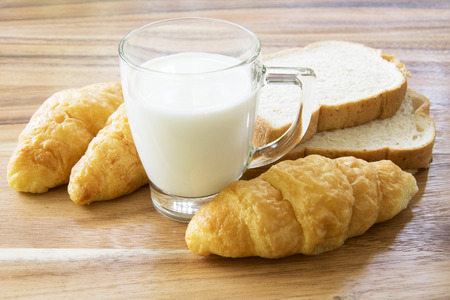 Breakfast with milk and  bread.の写真素材