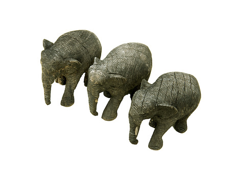 Carved wooden elephant on white backgroundの写真素材