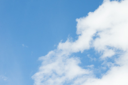 blue sky background with tiny cloudsの写真素材