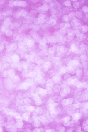 pink bokeh texture. Festive glitter background with defocused lightsの写真素材