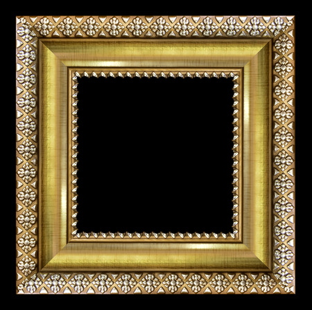 Gold vintage picture and photo frame isolated on black backgroundの写真素材