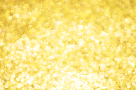 Defocused Bokeh twinkling lights Vintage background. Festive background with natural bokeh and bright lights.の写真素材