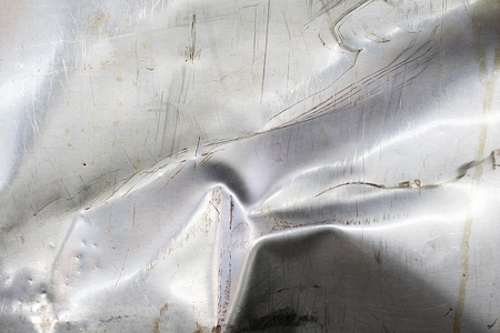 damaged metal plate ; Grunge texture backgroundの写真素材