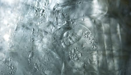 texture of frozen water drops cool ice glassの写真素材