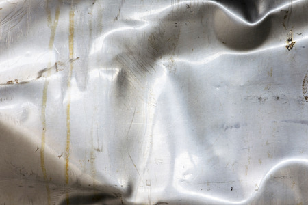 Old crumpled and scratched metal textureの写真素材