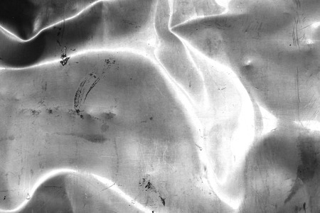Old crumpled and scratched metal textureの写真素材