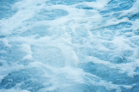 Blue clear fresh Water in hot tub. Spa massage background.の写真素材