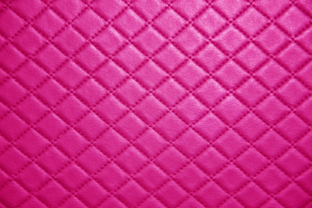 pink Leather texture with seam backgroundの写真素材