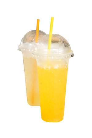 orange juice and Grapefruit juice in plastic cup isolated on white.の写真素材