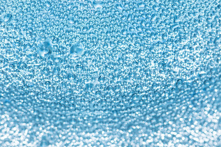 water drops on blue glassの写真素材