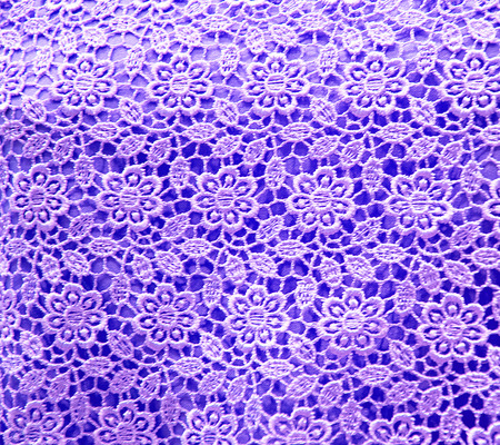 Crochet lace purple backgroundの写真素材
