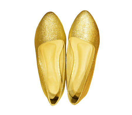 shoes isolated on white background. Golden and fashion woman shoes on a backgroundの写真素材