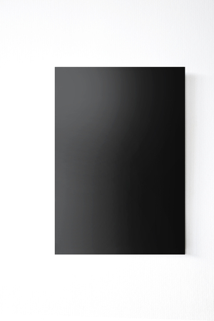 Empty blank black board on the wall.の写真素材