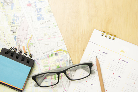 concept to plan travel on wooden background. top view, flat lay concept.の写真素材