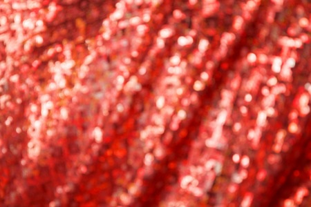 Red background of defocused abstract lights. bokeh lights.の写真素材