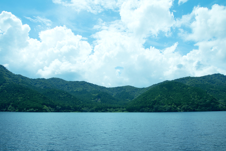 Mountain and sea with blue skyの写真素材