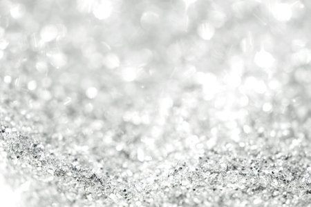 silver background of defocused abstract lights. golden bokeh lights.の写真素材