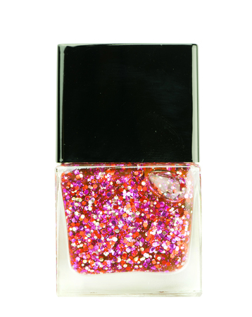 Glitter pink nail polish on a white background.の写真素材