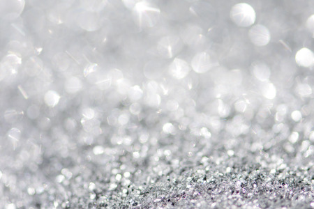silver background of defocused abstract lights. golden bokeh lights.の写真素材