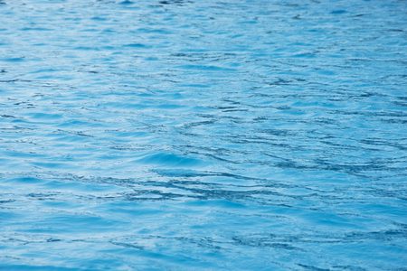 Blue sea surface with wavesの写真素材