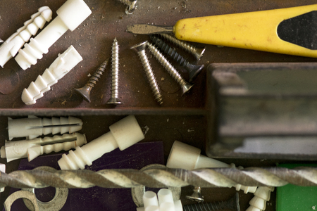 Toolbox, Screwdriver with screws and dowels for background.の写真素材