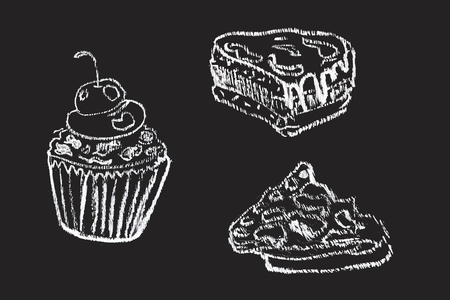Sketches of cake, cup cake and pie hand-drawn with chalks on blackboard.の写真素材