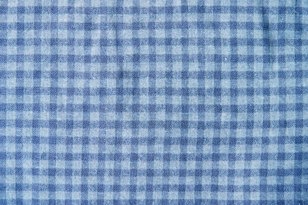 Tablecloth pattern background checkered with dark blue. picnic texture backgroundの写真素材
