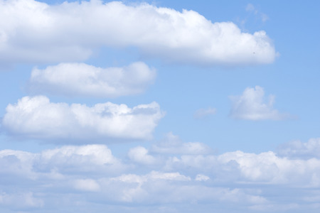 clouds and rainbow in the blue skyの写真素材