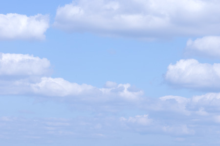 clouds and rainbow in the blue skyの写真素材