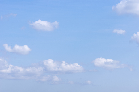clouds and rainbow in the blue skyの写真素材