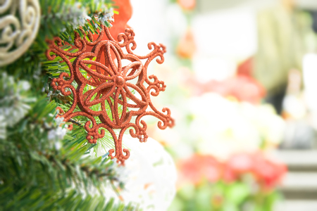Closeup on Christmas tree decoration over festive backgroundの写真素材