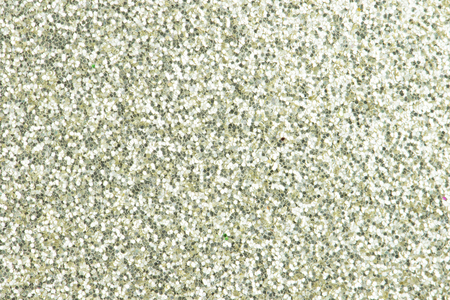 Silver sparkle glittering backgroundの写真素材