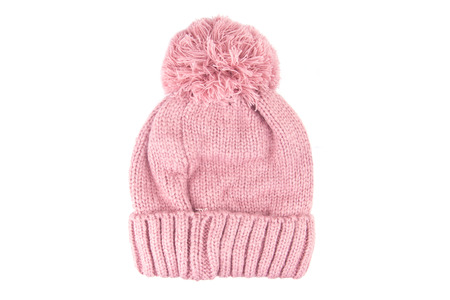 Pink wool knitted hat isolated on white background.の写真素材