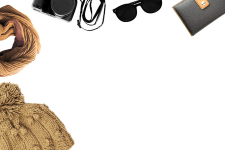 knitting wool sun glasses and winter hat on white background. Winter clothes. Winter accessories.の写真素材