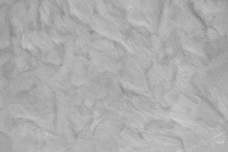 white wave plaster texture of concrete wall background.の写真素材