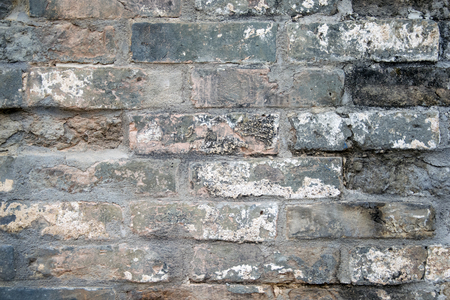Old brick wall background. Grunge texture. Black wallpaper. Dark surfaceの写真素材
