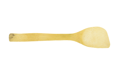 Wooden spatula and ladle on white background.の写真素材