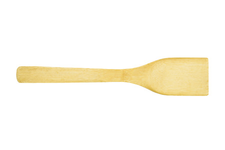 Wooden spatula and ladle on white background.の写真素材