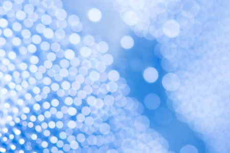 Reflection light on blue defocused abstract lights.の写真素材