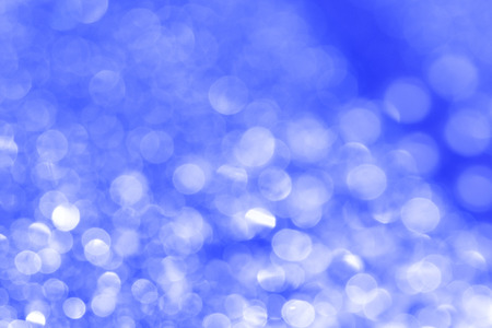 Reflection light on blue defocused abstract lights.の写真素材