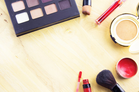 Make up and cosmetic beauty products on table wood background.の写真素材