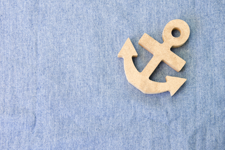 A wood anchor on fabric for backgroundの写真素材