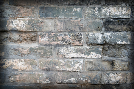 Old brick wall background. Grunge texture. Black wallpaper. Dark surfaceの写真素材