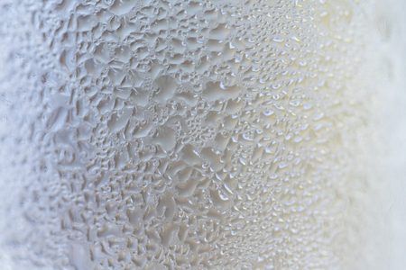 texture of frozen water drops cool ice glassの写真素材