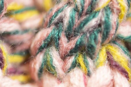 Background of the wool yarn. Woolen fabric texture closeup. Textile texture background. Detailed warm yarn background.の写真素材